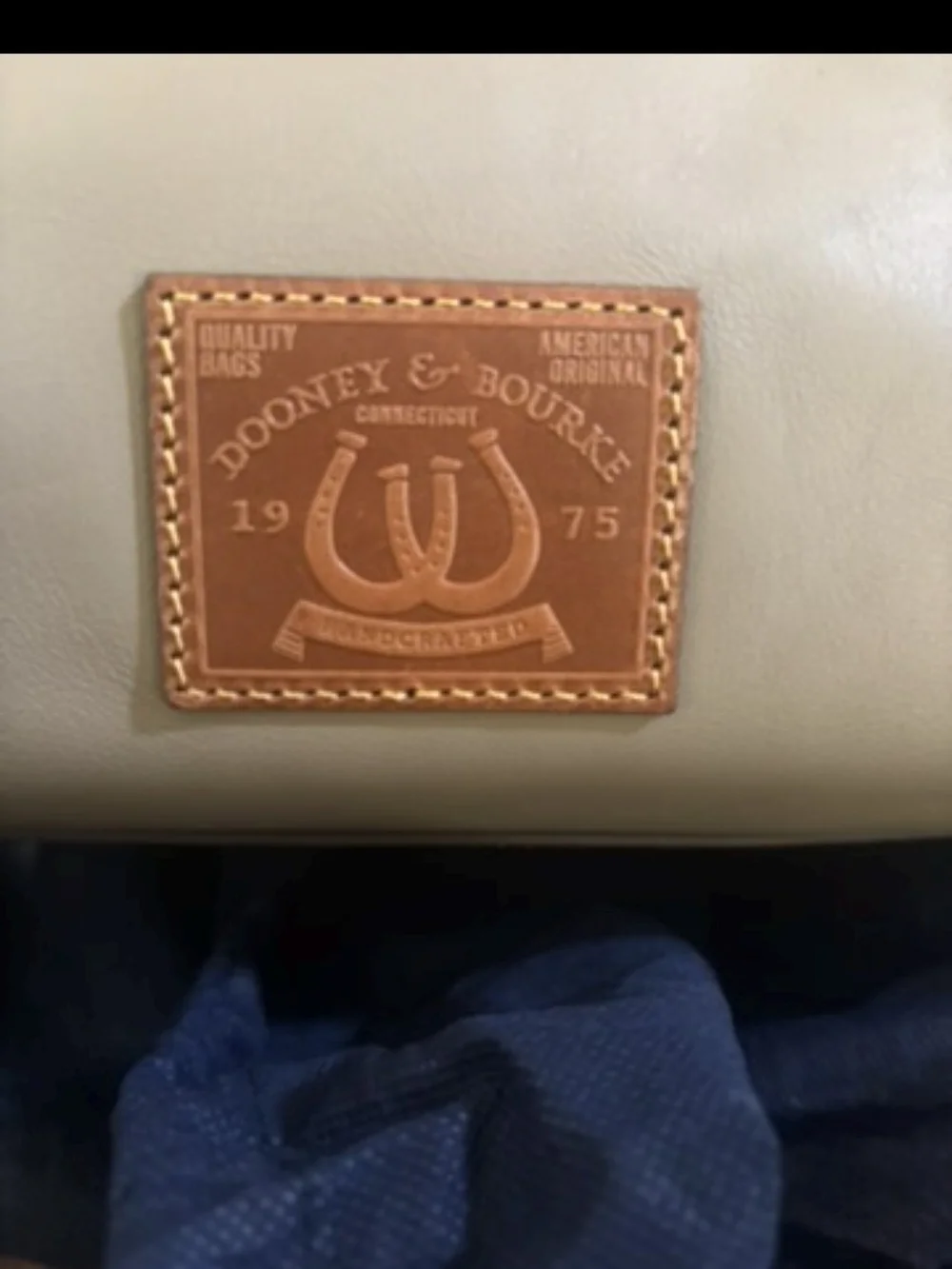 Dooney And Burch Taupe Leather  Crossbody Bag with Tassel